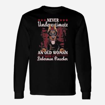 Never Underestimate An Old Woman With A Doberman Long Sleeve T-Shirt - Monsterry CA