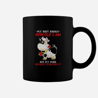 My Body Knows How Old I Am But My Mind Refuses To Believe It Cow Coffee Mug - Monsterry
