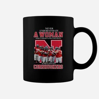Never Underestimate Awoman Who Understands Football And Loves Cornhuskers Coffee Mug - Thegiftio
