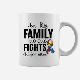 In This Family No One Fights Autism Alone Autism Awareness Coffee Mug | Crazezy
