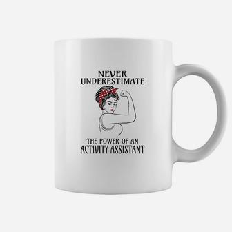 Never Underestimate Activity Assistant Coffee Mug | Crazezy