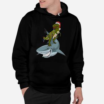 Christmas T-Rex With Xmas Lights Rinding A Shark Gift Funny Sweatshirt Hoodie | Crazezy CA
