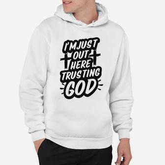 I'm Just Out Here Trusting God Funny Christian Gift Black Hoodie | Crazezy