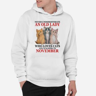 Never Underestimate An Old Lady Who Loves Cats - November Hoodie | Crazezy UK