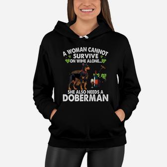 A Woman Cannot Survive On Wine Alone She Needs A Doberman Dog Women Hoodie - Seseable