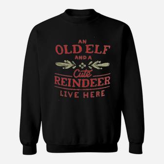 An Old Elf And A Cute Reindeer Live Here Sweatshirt | Crazezy CA