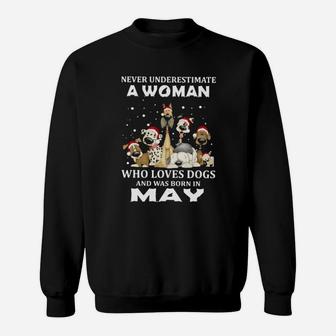Never Underestimate A Woman Who Loves Dogs And Was Born In May Sweatshirt - Monsterry