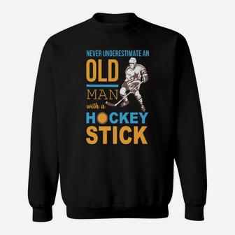 Never Underestimate An Old Man With A Hockey Stick Sweatshirt - Monsterry