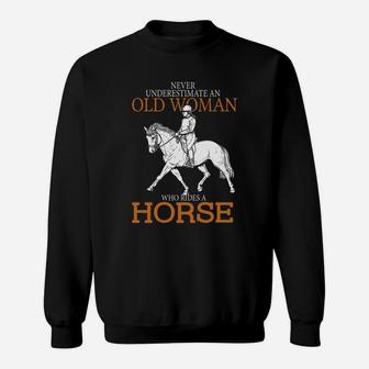 Never Underestimate An Old Woman Who Rides A Horse Sweatshirt - Thegiftio UK
