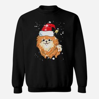 Pomeranian Licking Snow On Nose Santa Xmas Hat Sweatshirt - Monsterry