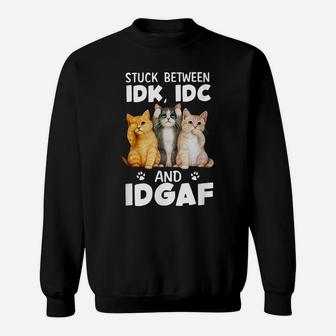 Stuck-Between-Idk-Idc-And-Idgaf Funny Cat Lovers Sweatshirt | Crazezy