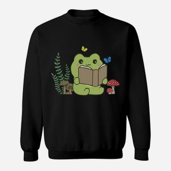 Womens Cute Frog Reading A Book On Mushroom Cottagecore Aesthetic Sweatshirt | Crazezy