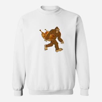 Bigfoot Carrying Turkey Funny Sasquatch Thanksgiving Sweatshirt - Thegiftio UK
