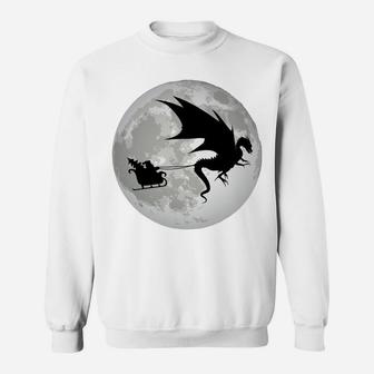 Christmas Santa Claus Flying Past The Moon W Dragon Design Sweatshirt Sweatshirt | Crazezy