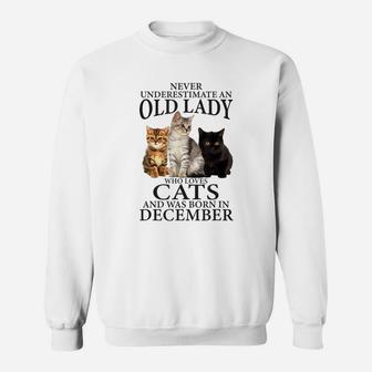 Old Lady Who Loves Cat And Was Born In December Funny Gift Sweatshirt | Crazezy AU
