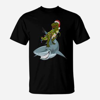 Christmas T-Rex With Xmas Lights Rinding A Shark Gift Funny Sweatshirt T-Shirt | Crazezy AU