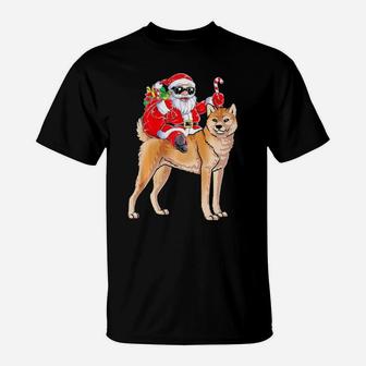 Santa Claus Riding Akita Xmas Gifts Dog T-Shirt - Monsterry