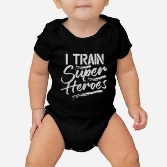 I Train Super Heroes Funny Dad Mom Coach Gift Teacher Baby Onesie | Crazezy AU