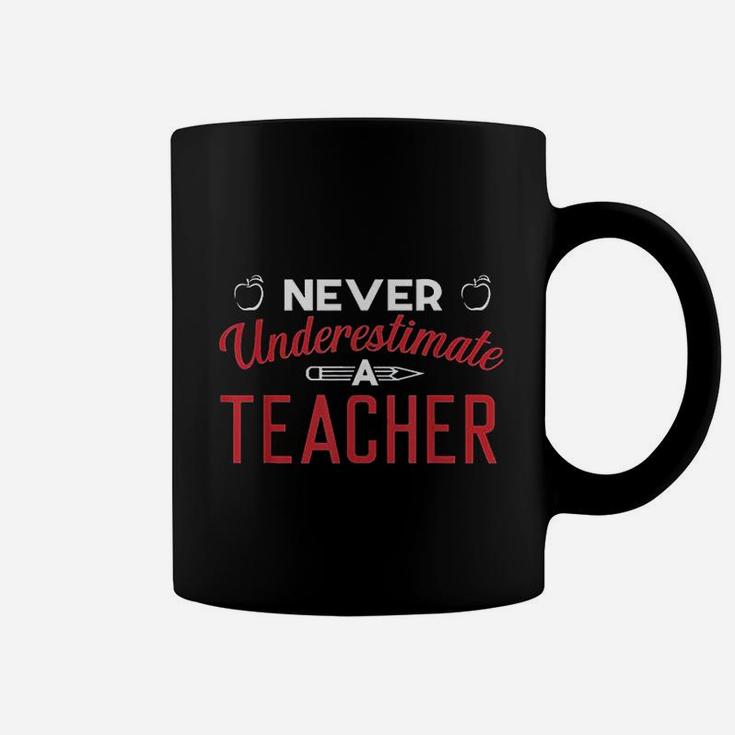 Never Underestimate A Teacher Coffee Mug