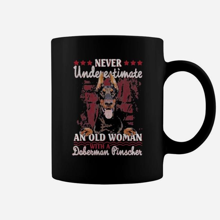 Never Underestimate An Old Woman With A Doberman Coffee Mug