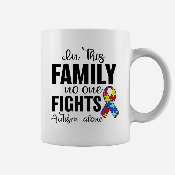 In This Family No One Fights Autism Alone Autism Awareness Coffee Mug