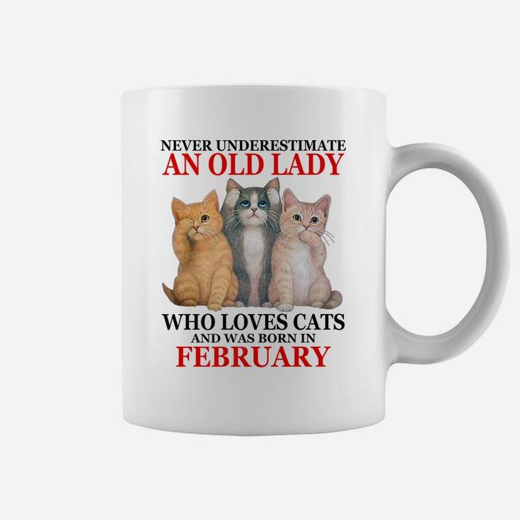 Never Underestimate An Old Lady Who Loves Cats - February Coffee Mug