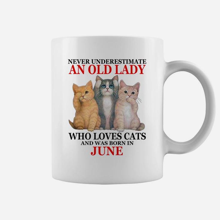 Never Underestimate An Old Lady Who Loves Cats - June Coffee Mug