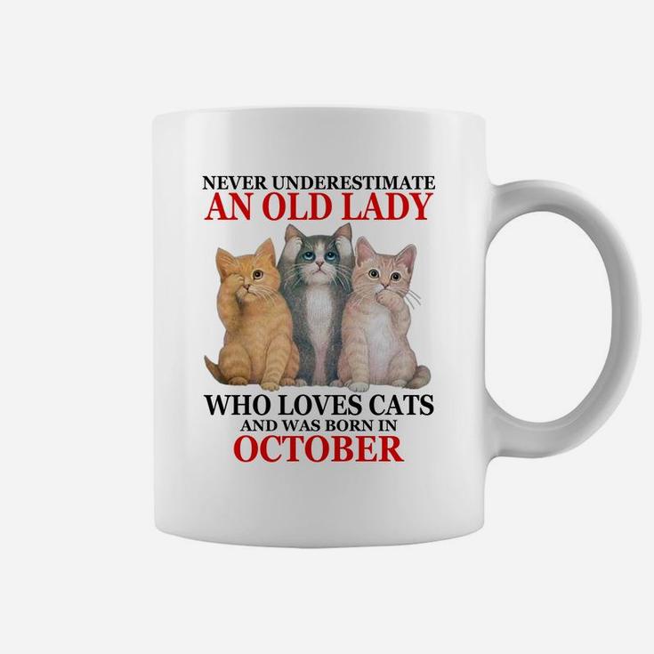Never Underestimate An Old Lady Who Loves Cats - October Sweatshirt Coffee Mug
