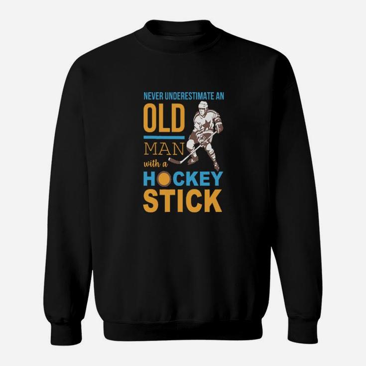 Never Underestimate An Old Man With A Hockey Stick Sweatshirt